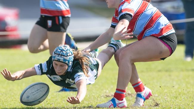 Warringah player Jasmin Berry scores a try against Souths. .