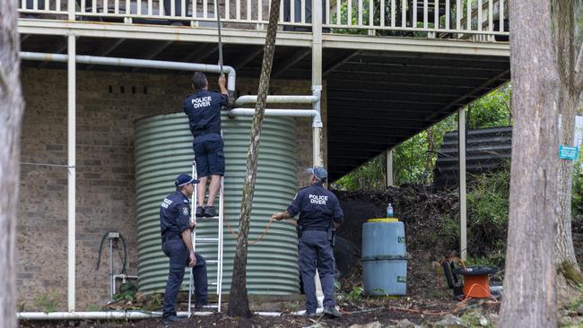 Police divers at William Tyrrell's late foster grandmother's home on Wednesday. Picture: Liam Mendes / The Australian