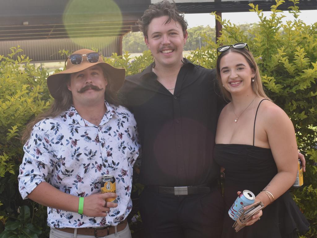 Cal Hall, Joshua Davies and Britney O'Donohue at the Yeppoon Turf Club's Derby Day races at Keppel Park Racecourse on November 2, 2024.