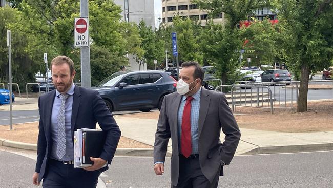 Former army major Tarek Elgayar (right) arrives at the ACT Law Courts for sentencing with lawyer Jacob Robertson from JDR Law. Picture: Julia Kanapathippillai