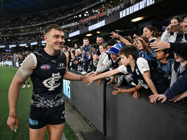 Patrick Cripps celebrates with Blues fans. Picture: Daniel Pockett/Getty Images