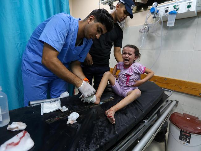 Palestinians injured in Israeli air raids arrive at Nasser Medical Hospital in Khan Yunis, Gaza. Picture: Getty Images