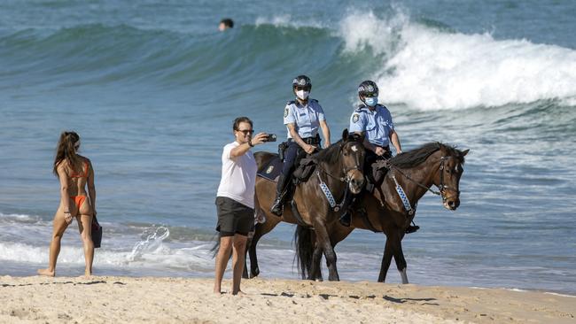 Mounted police at Bondi Beach on Monday as NSW police ramp up patrols and compliance measures to enforce the state’s tough new lockdown rules. Picture: Liam Mendes