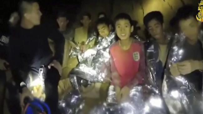 Twelve youth soccer players wait to be rescued from a flooded cave in 2018. Picture: Thai Navy Seal via AP