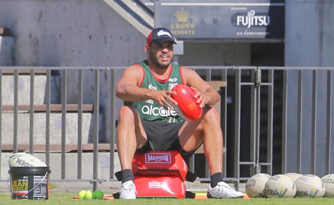 Greg Inglis watches on at South Sydney training as he recovers from an ACL injury. Picture: John Grainger