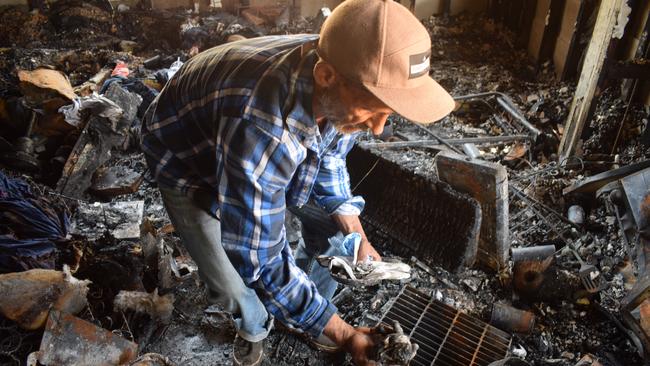 Bill Spangen among the ruins of his property at Philip Street, November 12 2019