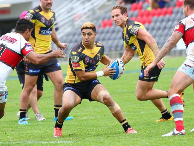 Redcliffe Dolphins vs Sunshine Coast Falcons in rugby league semi-final at Dolphin Oval. Eddie Tautali carries the ball for Sunshine Coast. Picture: Peter Cronin