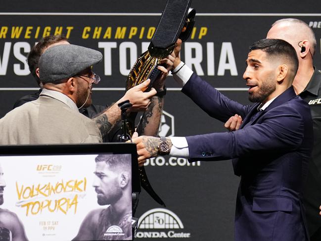 ANAHEIM, CALIFORNIA - FEBRUARY 15: (L-R) Alexander Volkanovski of Australia and Ilia Topuria of Germany exchange words during the UFC 298 press conference at Honda Center on February 15, 2024 in Anaheim, California. (Photo by Chris Unger/Zuffa LLC via Getty Images)