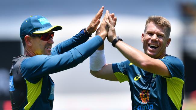 Justin Langer loves working with David Warner.