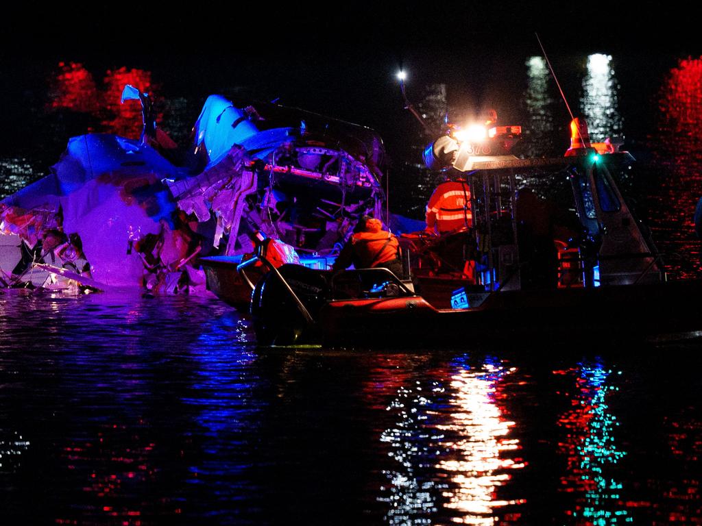 Emergency response teams assess airplane wreckage in the Potomac River near Ronald Reagan Washington Airport. Picture: Andrew Harnik/Getty Images/AFP