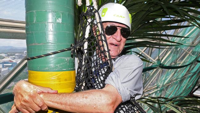 Kennedy MP Bob Katter grabs a pole after overcoming his fear of heights to zip line over Goliath, the 4.1m crocodile at Cairns ZOOM and Wildlife Dome. Picture: Anna Rogers