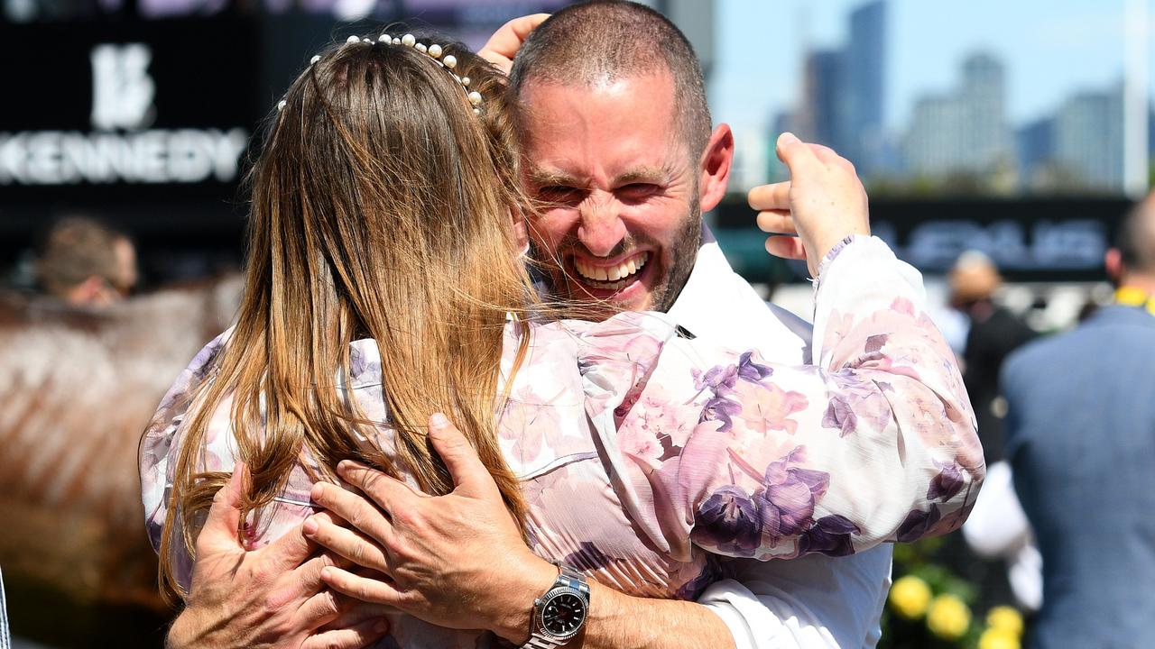 Owner Brae Sokolski celebrates with assistant trainer Johanne Taylor .