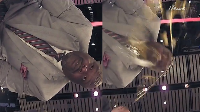 Charles Barkley smashes an egg over Shaq’s head