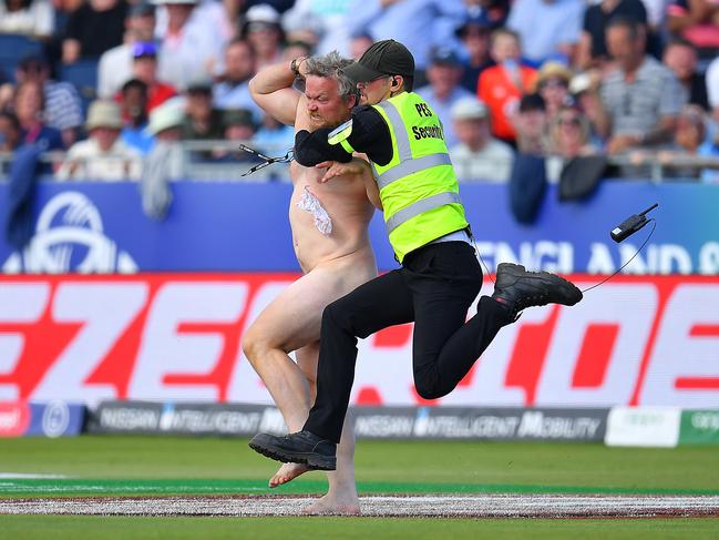 A streaker meets a crashing end. (Photo by Clive Mason/Getty Images)