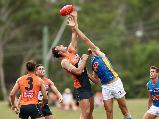 SYDNEY, AUSTRALIA - MARCH 04: Braydon Preuss of the Giants competes for the ball against Jarrod Witts of the Suns during the AFL Practice Match between the Greater Western Sydney Giants and the Gold Coast Suns at Blacktown International Sportspark on March 04, 2023 in Sydney, Australia. (Photo by Matt King/Getty Images)