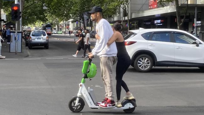 Australian tennis player Nick Kyrgios riding an e-scooter on Elizabeth St in Melbourne. Picture: AAP Image/James Ross