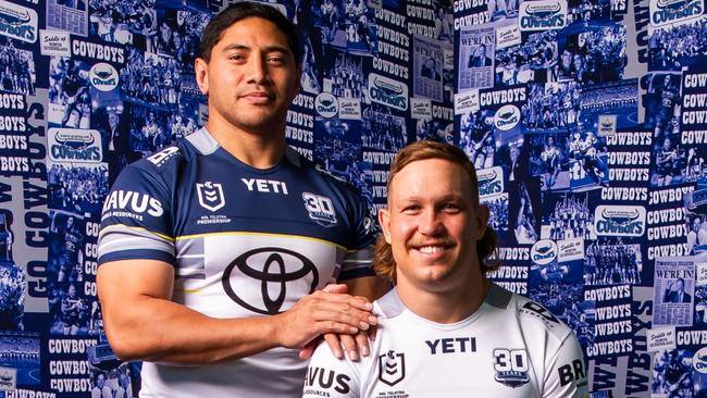 Jason Taumalolo and Reuben Cotter in the 2025 home and away jerseys.