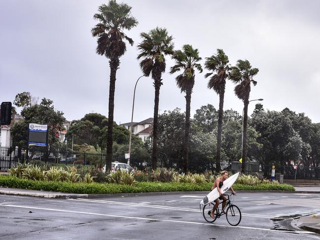 Wet weather in Bondi Beach on Sunday the Australian east coast was battered with a torrential downpour. Picture: NCA NewsWire/Flavio Brancaleone