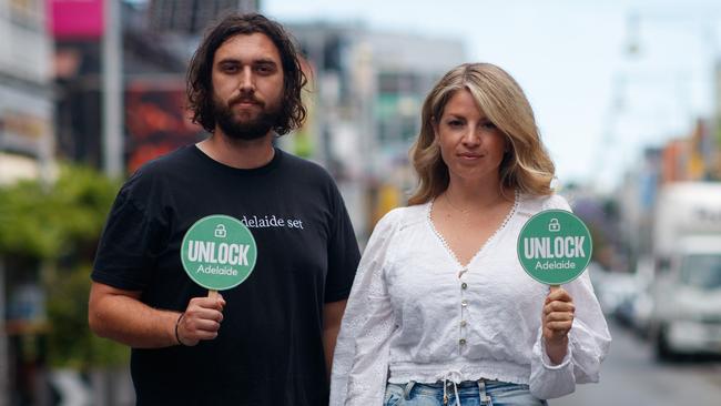 George-Alexander Mamalis and Bianca Tropeano in Hindley St, where they are launching a new campaign called Unlock Adelaide to have the late night lockout scrapped. Picture: Matt Turner