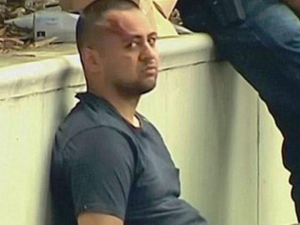 Abuza Sultani after being arrested at an Olympic Park unit block in 2016, in relation to the murder of Pasquale Barbaro.