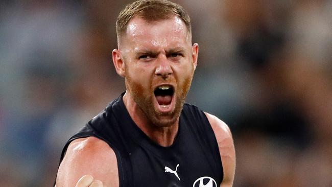 MELBOURNE, AUSTRALIA – MARCH 17: Sam Docherty of the Blues celebrates a goal during the 2022 AFL Round 01 match between the Carlton Blues and the Richmond Tigers at the Melbourne Cricket Ground on March 17, 2022 In Melbourne, Australia. (Photo by Dylan Burns/AFL Photos via Getty Images)