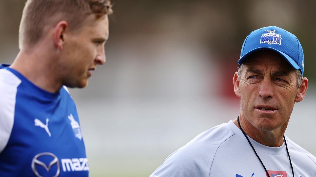 North Melbourne coach Alastair Clarkson talks with captain Jack Ziebell at training. Picture by Michael Klein