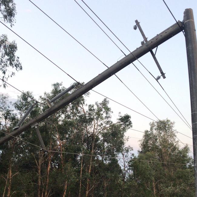 A snapped power pole at Forest Glen.