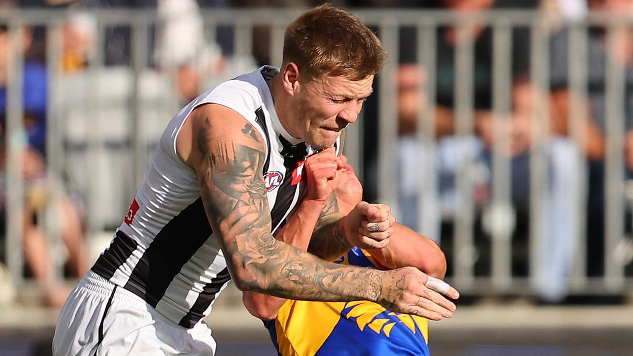PERTH, AUSTRALIA - JUNE 03: Jordan De Goey of the Magpies bumps Elijah Hewett of the Eagles during the round 12 AFL match between West Coast Eagles and Collingwood Magpies at Optus Stadium, on June 03, 2023, in Perth, Australia. (Photo by Paul Kane/Getty Images)