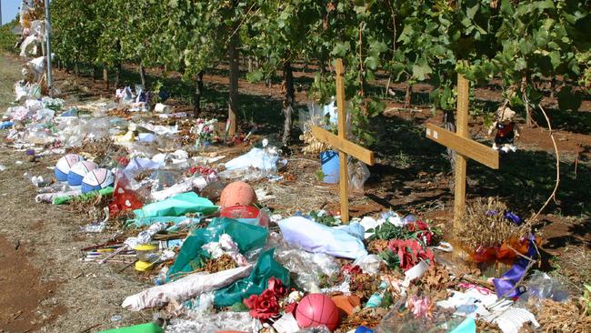 Floral tributes line the crash scene where six teenagers were killed and seven injured.