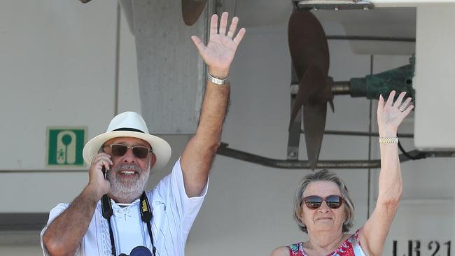 French passengers Jackie and Eliane Roque wave to their friends on land. Picture: Getty Images