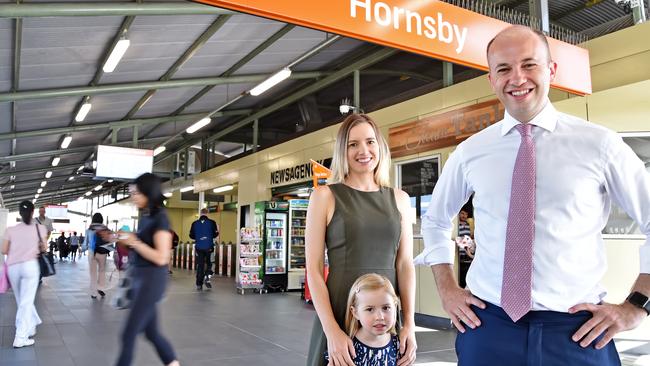 Hornsby state Liberal MP Matt Kean with commuter family Wendy Paterson &amp; daughter Monique, 4, at Hornsby Station at Hornsby on Tuesday December 4th. Hornsby MP Matt Kean is set to announce a new commuter carpark for Hornsby. Picture: AAP IMAGE / Troy Snook