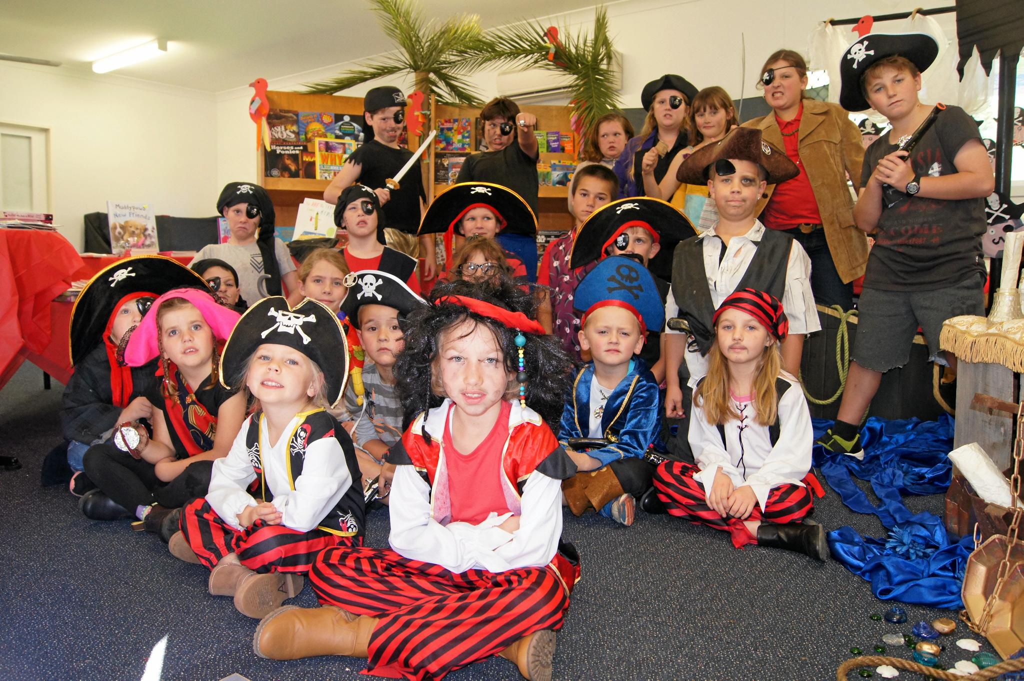 Students, teachers and parents dress up as pirates for a reading day at ...