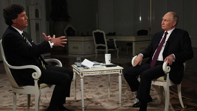 Vladimir Putin gives an interview to US talk show host Tucker Carlson at the Kremlin. Picture: AFP.