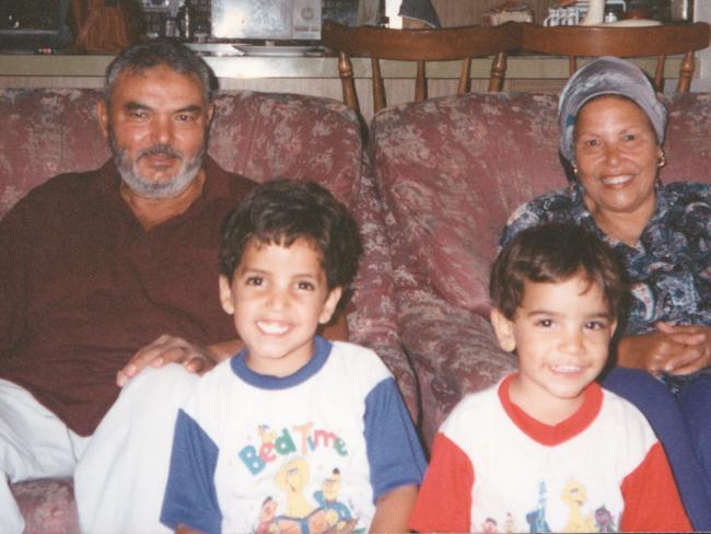 Shortly after they were married, Anne’s husband started hitting her. She eventually left him. (Pictured here are Anne’s sons Adam and Karim with her parents in 1995).