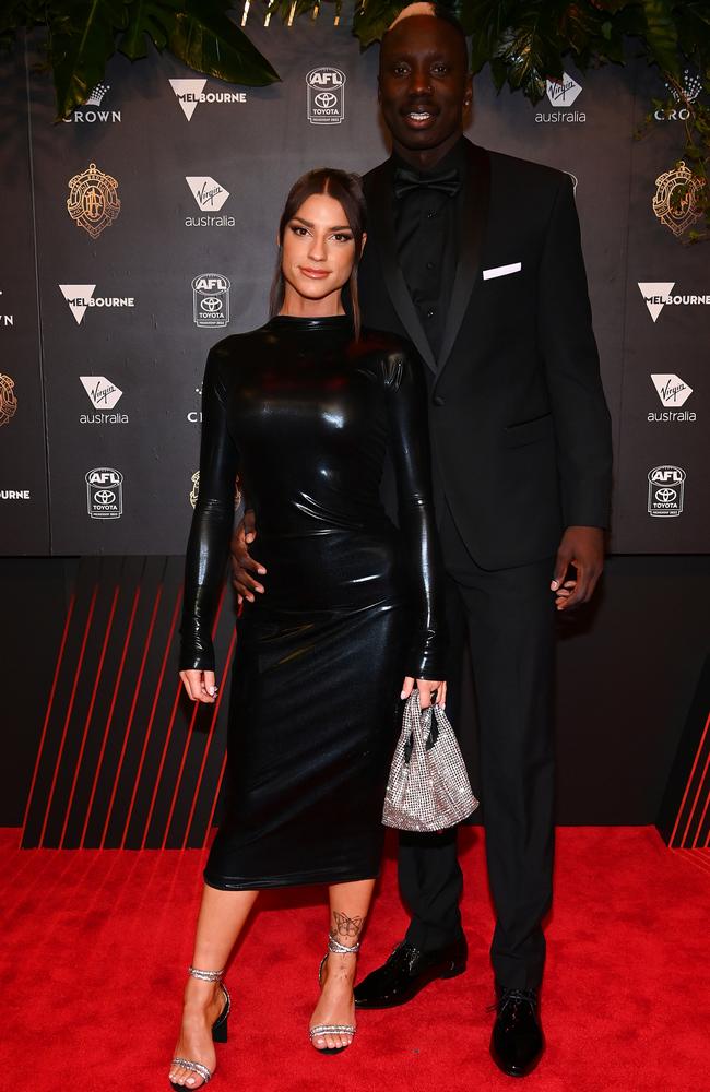 Mabior Chol and girlfriend Lauren Harris. Picture: Getty