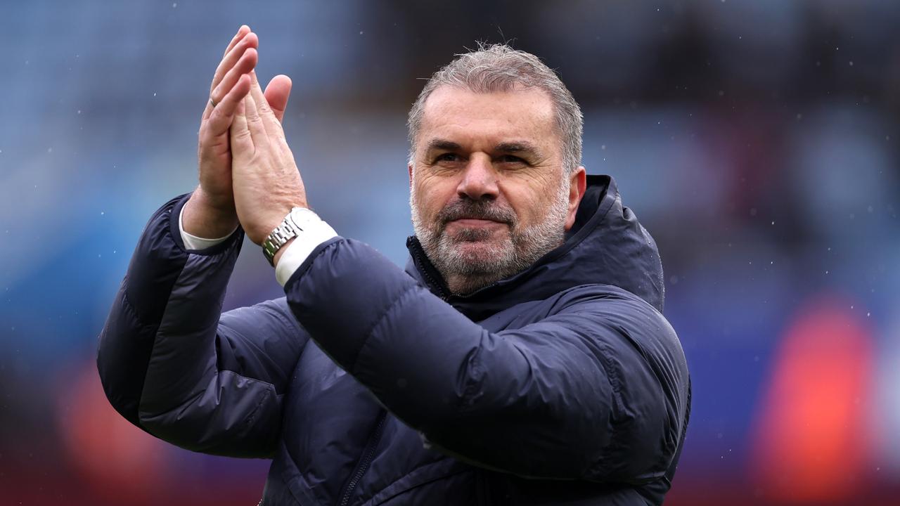 Postecoglou applauds the travelling Spurs fans after a massive win over Aston Villa. (Photo by Alex Pantling/Getty Images)