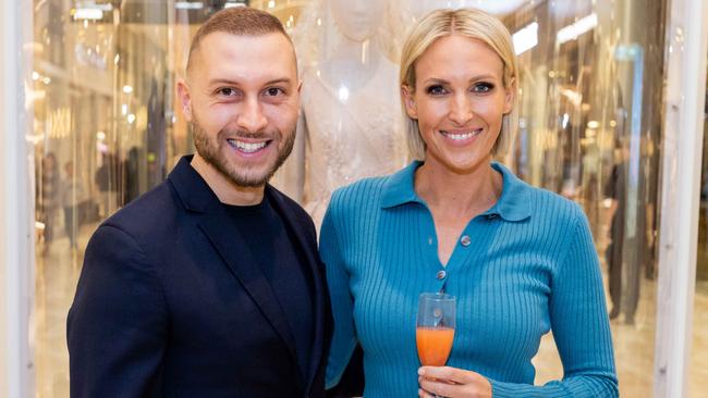 Paul Vasileff (left) and Rebecca Morse (right) at the Rundle Place Paolo Sebastian event. Picture: Angus Northeast