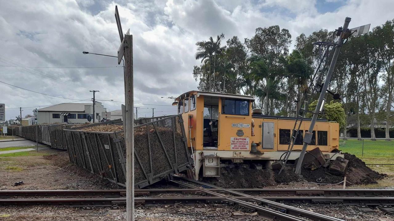 Emergency services responded after a cane train derailed in Ingham on July 24. Picture: Cameron Bates