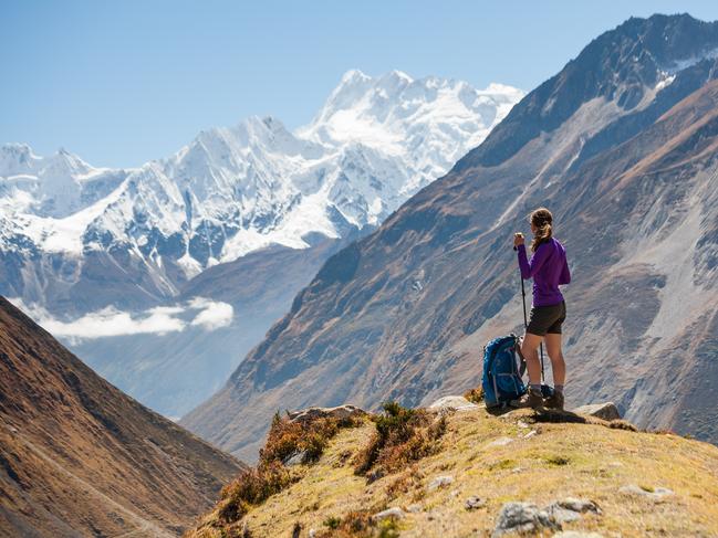 Trekker rests on Manaslu circuit trek in Nepal. Picture: iStockLisa Mayoh, trends adventure, Escape