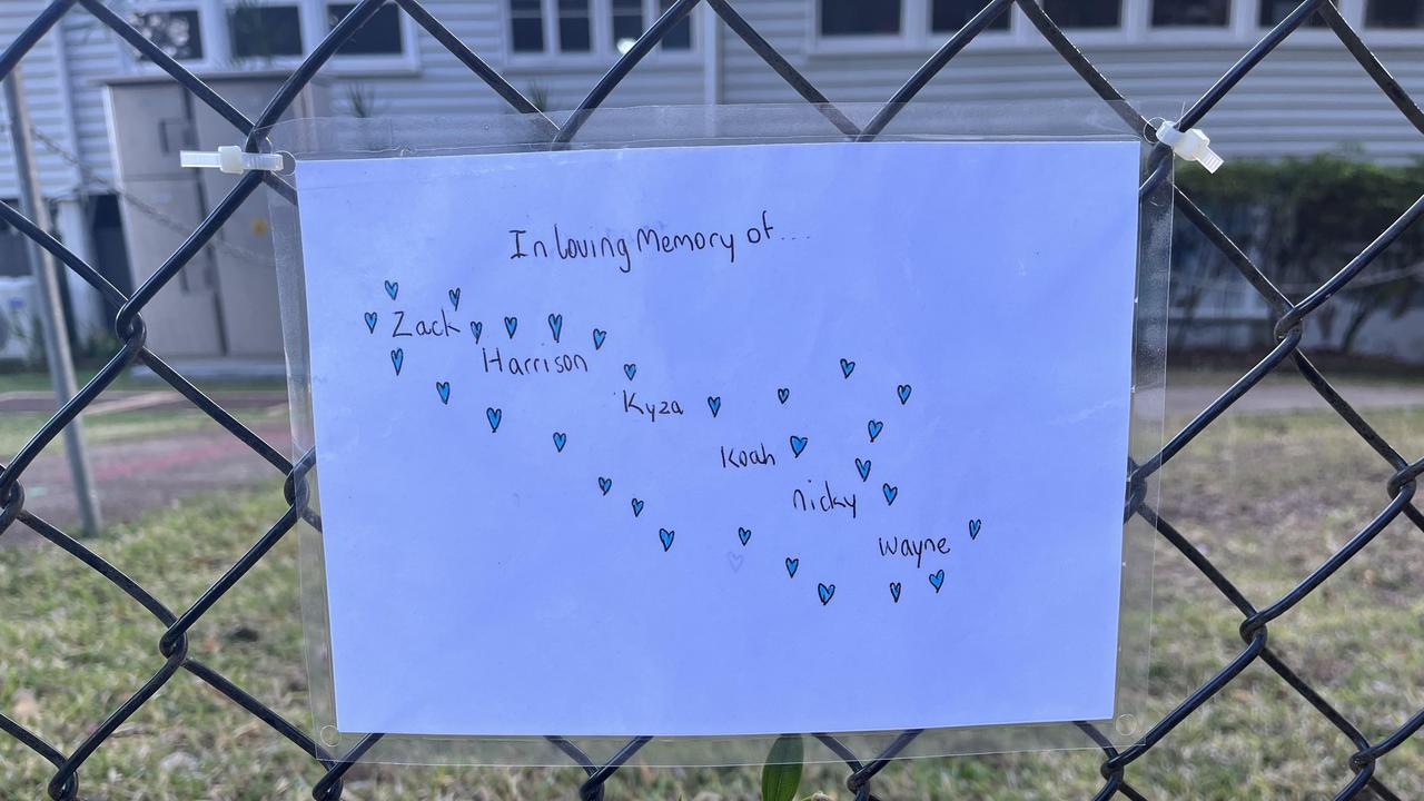 Tributes outside Russell Island State School for the children lost in the fire. Picture: Isabella Holland