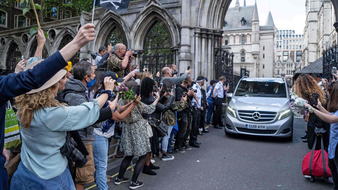 Fans of Johnny Depp gather around his car as he is driven away form the High Court. Picture: Niklas Halle’n/AFP