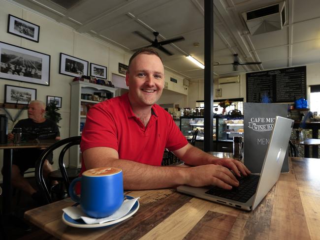 FOR THIS SATURDAY'S COURIER-MAIL PROPERTY SPREAD. Pic of a young soldier Dan Mallon at Cafe Metz in Canungra who has invested his disposable income in ETFs in order to pay off his home. To go with story on the Qld suburbs with the highest disposable income. Pic Adam Head