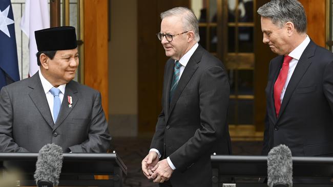 Indonesian Defence Minister and president-elect Prabowo Subianto, left, Anthony Albanese and Defence Minister Richard Marles in Canberra on Tuesday. Picture: NewsWire / Martin Ollman