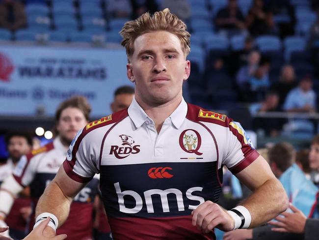 SYDNEY, AUSTRALIA - MAY 09:  Tate McDermott of the Reds leads out the Reds during the round 13 Super Rugby Pacific match between NSW Waratahs and Queensland Reds at Allianz Stadium, on May 09, 2025, in Sydney, Australia. (Photo by Matt King/Getty Images)