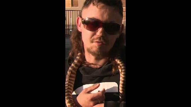 Man Interviewed With Epic Mullet Holding A Snake Au