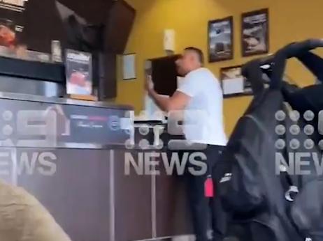 The man confronts staff at Zarraffa's Robina on the Gold Coast. Picture: 9 News Gold Coast