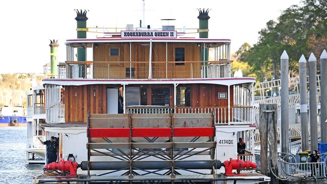 Police on board (Bottom Left) and damage (First floor left) on the Kookaburra Queen Kookaburra Queen docked in Brisbane CBD after a collision. Thursday September 12, 2019. (AAP image, John Gass)