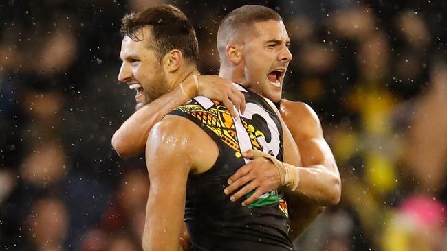 Toby Nankervis and Shaun Grigg celebrate a goal for the Tigers. Picture: Getty Images