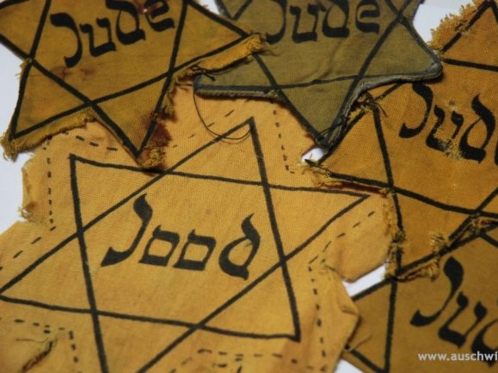 Yellow "David stars" with a word "Jew" – marks introduced by German Nazis for the Jews, especially in occupied countries of western Europe are now on display at the Auschwitz-Birkenau memorial and museum – a former German Nazi concentration and extermination camp in Poland. Picture: Pawel? Sawicki/auschwitz.org photo gallery