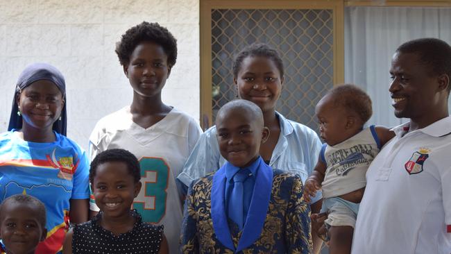 Innocent Muhindo with father Nsenga and siblings Neema, Esther, Espe, Nyota, Moses and Joshua. Picture: Holly Fishlock.